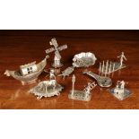 A Group of Eight Silver Miniature Ornaments, mainly Dutch.