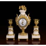 A Small White Marble, Gilt Bronze & Paste Clock Garniture Set in the Louis XVI Style.