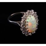 A Stunning 18Ct White Gold Opal and Diamond Ring.