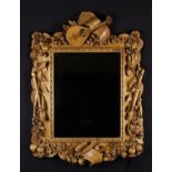 A Fabulous Carved Wooden Wall Mirror in the style of Grinling Gibbons.