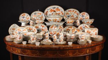 An Extensive Chinese Dinner Service painted with Koi fish enriched with gilded details and framed