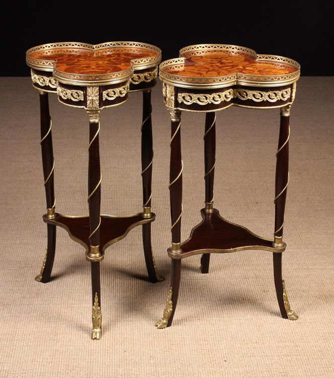 A Pair of Decorative Trefoil-topped Marquetry Occasional Tables with gilt metal mounts.