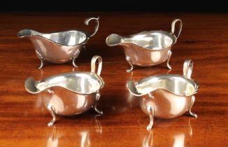 A Pair and a Single Silver Sauce Boat by Viner's Ltd (Emile Viner);