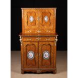 A Decorative Tulipwood Veneered Secrètaire Cabinet with diagonally grained quarter veneers adorned
