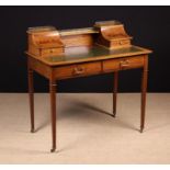 An Edwardian Sheraton Style Mahogany Writing Desk inlaid with satinwood cross-banding edged in