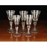 Five Engraved Hand-blown Wine Glasses.