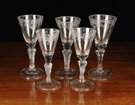 Five Engraved Hand-blown Wine Glasses.