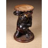 An Early 20th Century Carved & Polychrome Painted Wooden Blackamoor Stand.