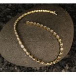 A 18 Carat Yellow Gold Necklace by Kutchinsky, Circa 1970's 14½" (37 cm).