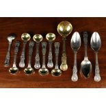 A Set of Eight Paul Storr Silver & Gilt Double Shell & Laurel Pattern Mustard Spoons stamped with
