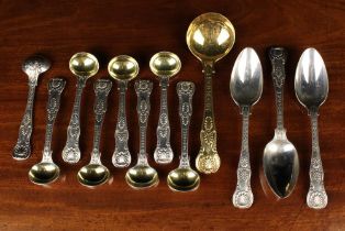 A Set of Eight Paul Storr Silver & Gilt Double Shell & Laurel Pattern Mustard Spoons stamped with