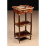 A Late 19th Century French Brass Mounted Parquetry Three-tier Bijouterie Table inlaid with a