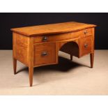 An Edwardian Serpentine Front Satinwood Sideboard/Dressing Table bordered with diagonally grained