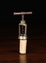 A German Brass-Framed Steel Corkscrew patented by Ernst Scharf in 1901 stamped to the top of the