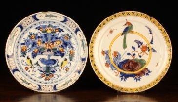 A Pair of 18th Century Polychrome Delft Plates: One decorated with a bird perched on a yellow hoop