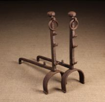 A Pair of 17th Century Style Wrought Iron Fire Dogs.