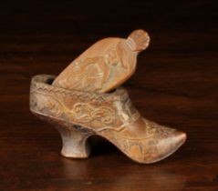 An 18th Century Carved Treen Snuff Box in the form of a Lady's Shoe.