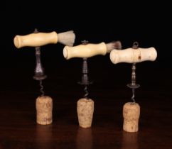 Three 19th Century Straight-pull Corkscrews having decoratively turned bone handles.