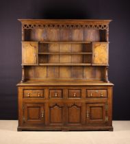 A Large 18th Century Style Oak Enclosed Dresser with Rack.