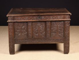 A 17th Century Carved Oak Coffer, typical of those produced in East Devon.
