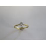 A hallmarked 18ct yellow gold and platinum diamond solitaire ring size N - approx weight 2 grams -