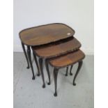 A nest of three tables on cabriole legs - Height 54cm x 60cm x 40cm