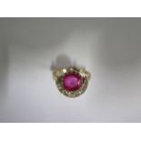 A yellow gold ruby or spinel and diamond crescent ring the centre stone approx 9mm x 4.5mm - tests