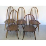 Four Ercol kitchen chairs and an Ercol armchair