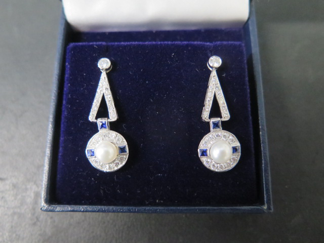 A pair of 18ct white gold Art Deco style pearl, sapphire and diamond drop earrings - approx 31mm x