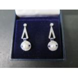 A pair of 18ct white gold Art Deco style pearl, sapphire and diamond drop earrings - approx 31mm x