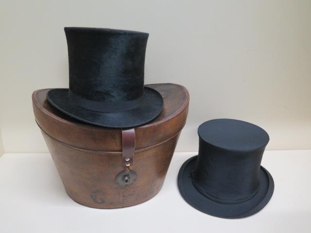 A Victorian leather top hat box with a tall brushed silk top hat - approx size 7 and a collapsible