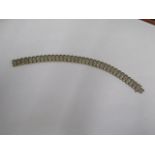 A 10ct yellow gold diamond bracelet stamped TW 3 - Length 17cm, approx weight 15.7 grams - good