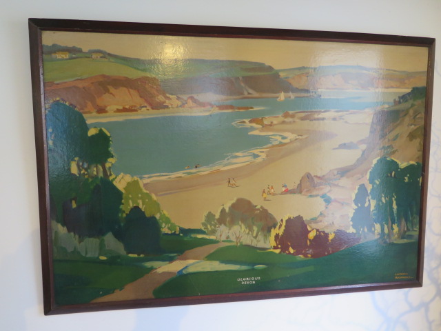 A British Railways framed poster Glorious Devon with O.C.S. label verso dated 5/9 1952 C/O Station