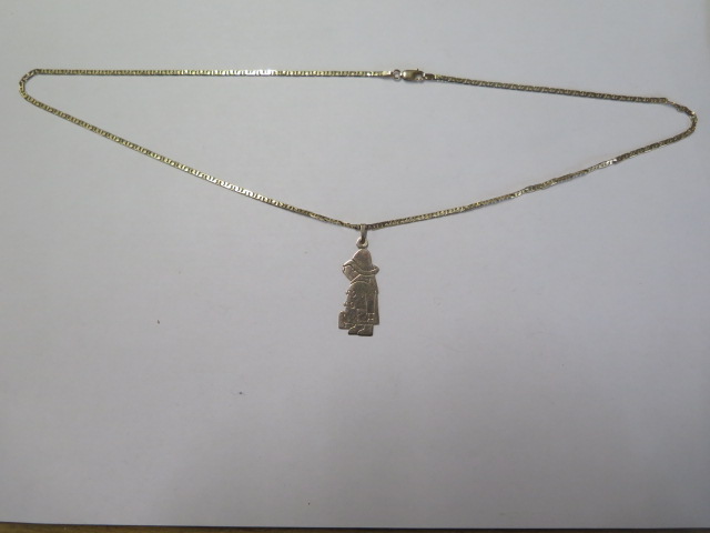 A 9ct yellow gold Paddington Bear pendant on a 9ct 56cm chain - approx weight 8.8 grams