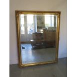 A large modern gilt mirror - 139cm x 106cm