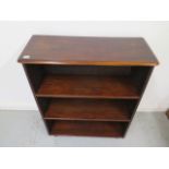 A mahogany bookcase with fixed shelves - Height 99cm x 80cm x 33cm