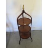 A line inlaid mahogany three tier cake stand - Height 93cm