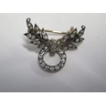 A gilt metal diamond foliate and drop ring pendant/brooch with screw off back - some bending,