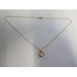 A 9ct yellow gold pearl pendant on a 42cm 9ct chain - approx weight 1.7 grams