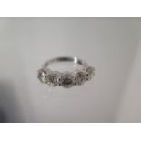 A five stone diamond ring - approx 2.75ct of diamonds set in platinum - ring size M - head size