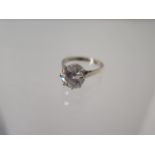 A 9ct white gold Moissanite ring 1cm diameter - ring size M - approx weight 4 grams