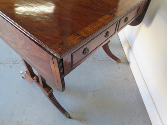 A late 19th century mahogany drop leaf sofa stretcher table with two active and two dummy drawers on - Image 7 of 7