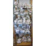 A good collection of Portmeirion Botanic garden table ware including a large bread crock, jugs,