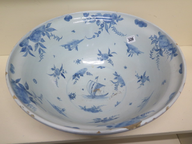 A large Delft blue and white bowl decorated with ships, villas and fruit - Height 20cm x Diameter