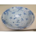 A large Delft blue and white bowl decorated with ships, villas and fruit - Height 20cm x Diameter