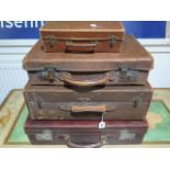 Two vintage leather suitcases and two fibre cases