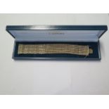 A 9ct yellow gold bracelet - Length 18cm x Width 2.5cm - approx weight 43.4 grams - generally good