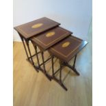 A nest of three mahogany side tables with inlaid tops - Height 50cm x 49cm x 33cm