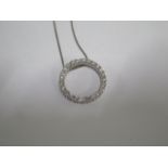 A 14ct white gold diamond circle pendant - Diameter 3cm - on a 9ct white gold 40cm chain - approx