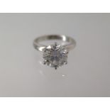A white metal diamond solitaire ring approx 2.5ct ring size M - approx weight 4.4 grams - diamond
